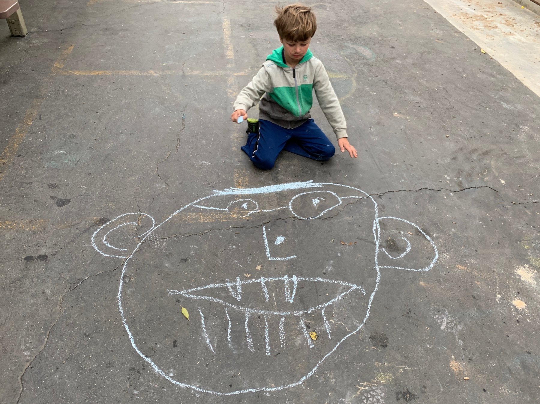 ES Boy play yard chalk drawing