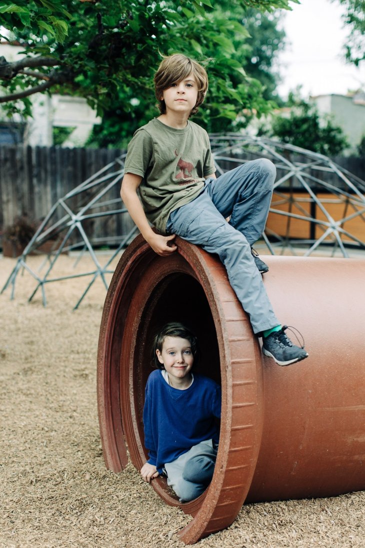 ES boys play yard pipe dome vertical
