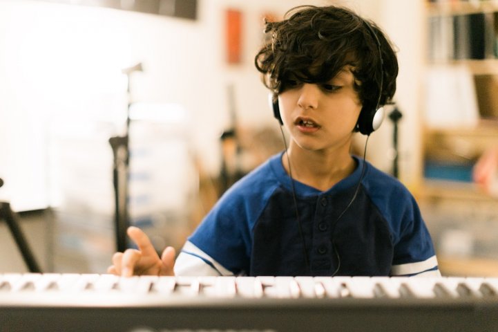 ES boy keyboard play music room